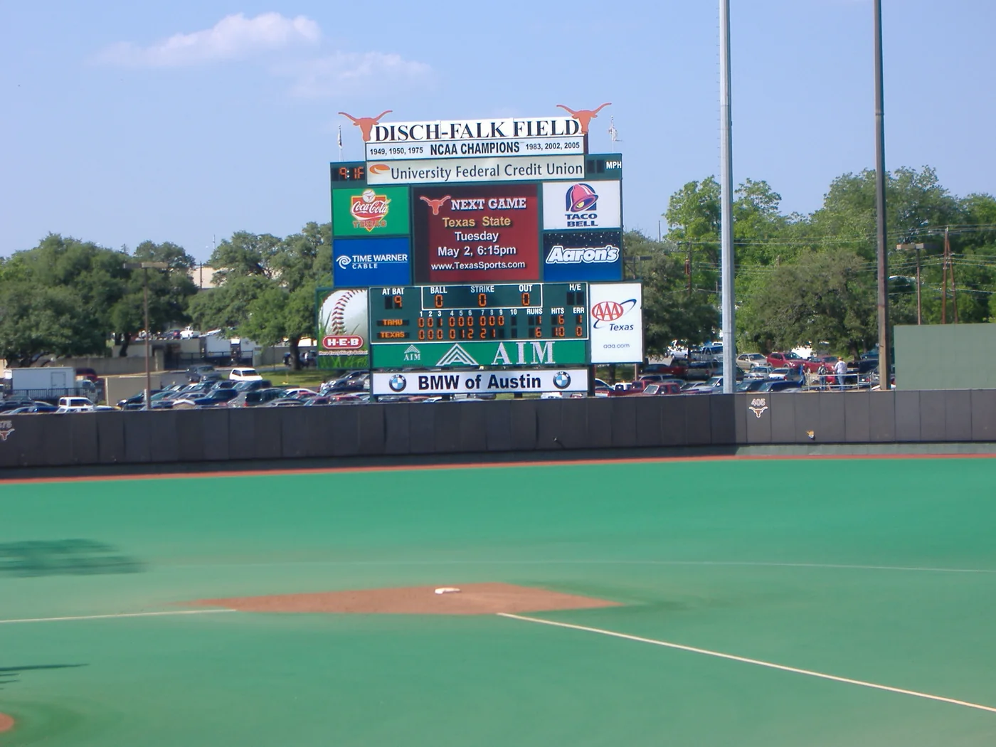 Historic Texas baseball scoreboard beyond the outfield at UFCU Disch-Falk Field.