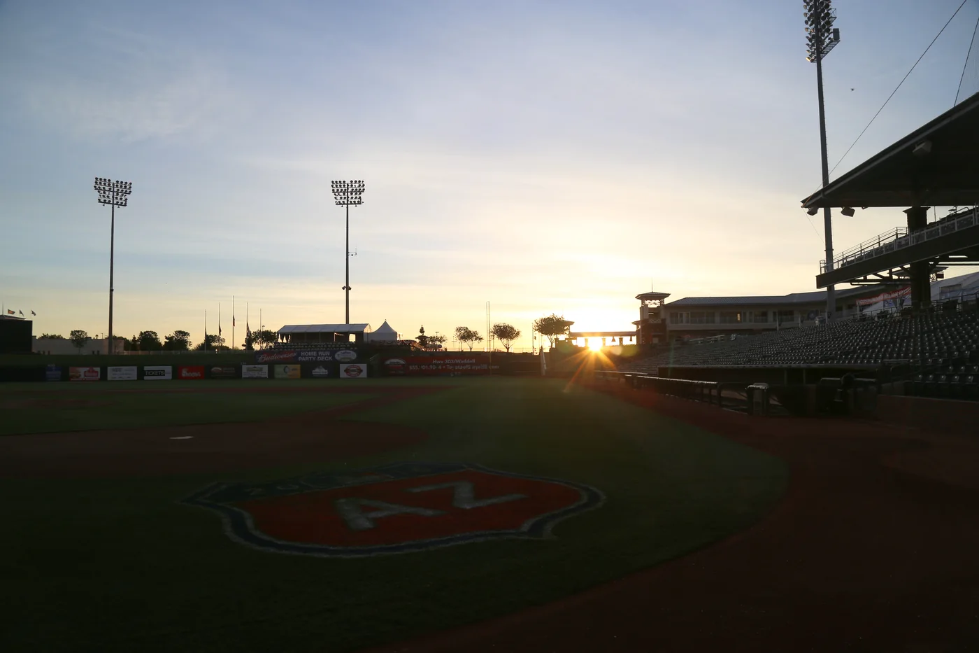Sun rising behind the outfield at Surprise Stadium in Arizona.